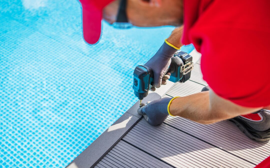 person conducting pool renovation on pool deck